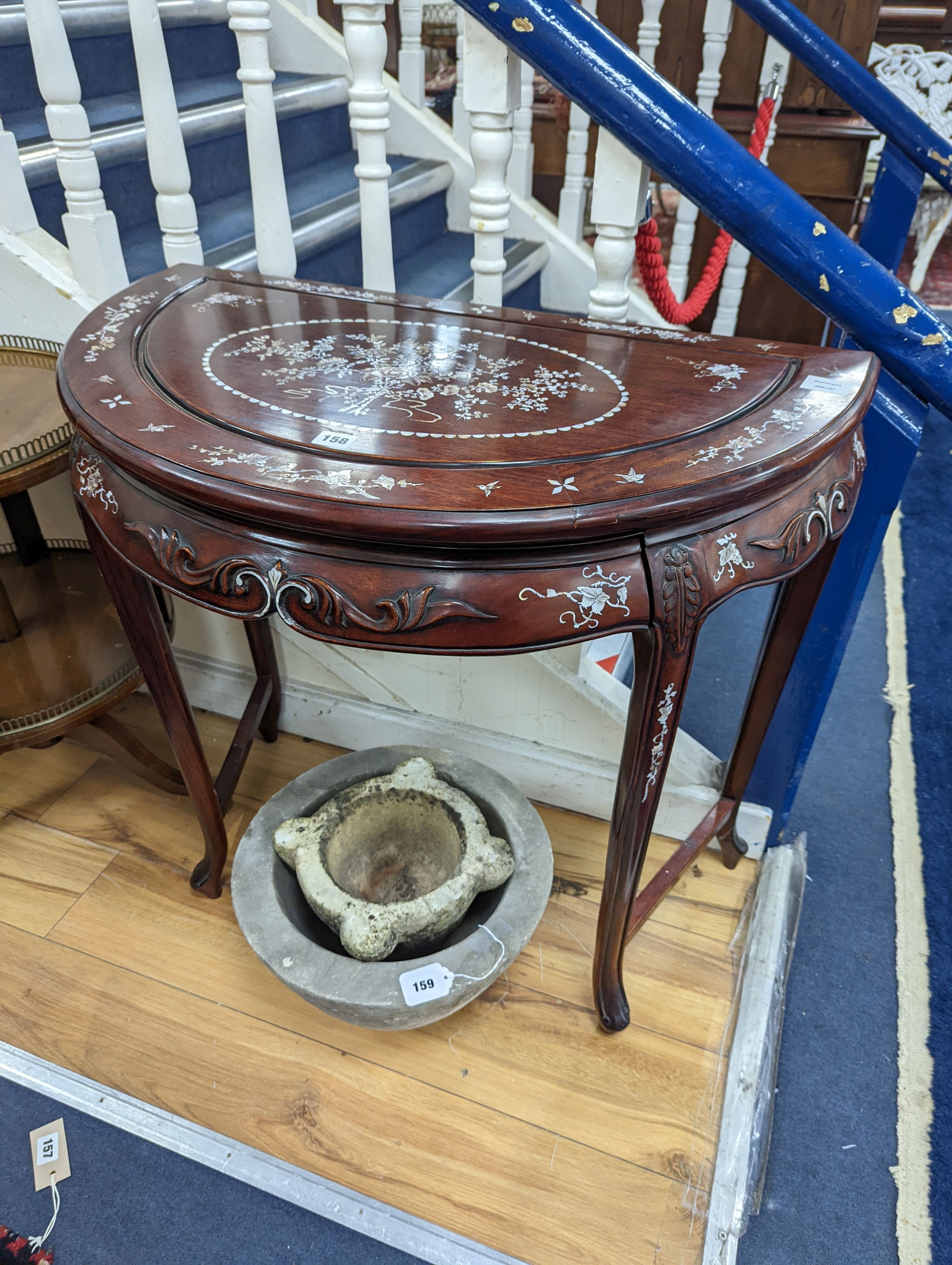 A Chinese hardwood and mother-of-pearl inlaid demi lune side table, width 80cm, depth 45cm, height 76cm